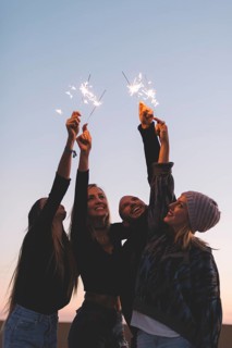 Friends with sparklers evening