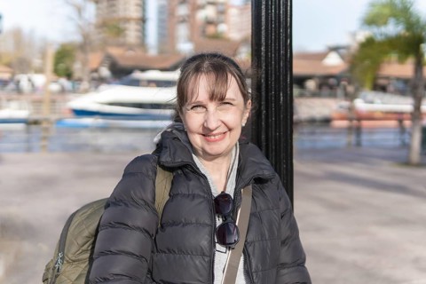 Portrait of a tourist walking along Paseo Victorica