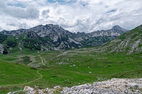 Mountain and rocky landscape around the Durmitor massif and the Dinarides mountain group. The Durmitor National Park surrounding the massif is a UNESCO World Heritage Site. Zabljak