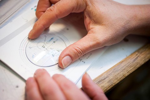 Fitting of a spectacle lens by an optician