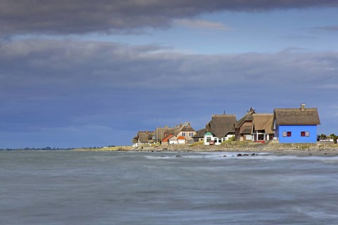 Beach houses along the Baltic Sea on the peninsula Graswarder