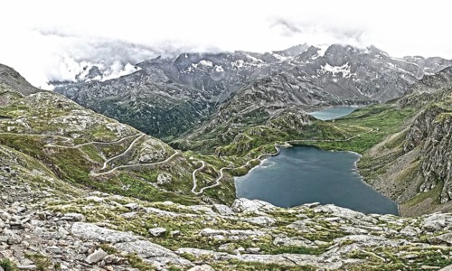 Photo with reduced dynamic range saturation HDR of view of serpentines with hairpin bends from Colle del Nivolet