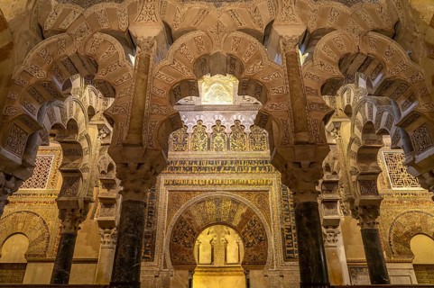 Artfully decorated mihrab in the interior of the Mezquita