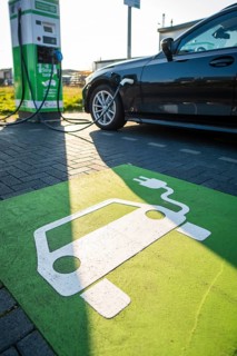 An e-car charges at a public charging station in Duesseldorf