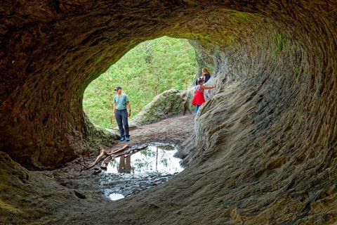 Stone tunnel at the rock formation Drei Zinnen