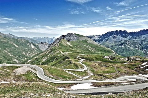 Photo with reduced dynamic saturation HDR of mountain pass alpine mountain road alpine road pass road pass in French Alps