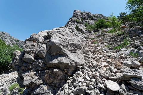Steep rocks and boulders in the Velebit limestone mountains in Paklenica National Park in northern Dalmatia. Paklenica Starigrad