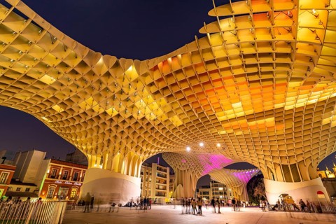 The futuristic wooden construction and observation deck Metropol Parasol at the Plaza de la Encarnacion at dusk