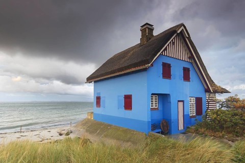 Blue beach house on the peninsula Graswarder