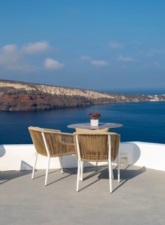 Sea view from terrace with chairs and table