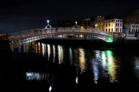 A view of the Ha'penny Bridge in Dublin at night. Dublin