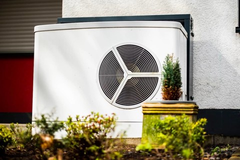 Heat pump in the front garden of a terraced house in Monheim am Rhein
