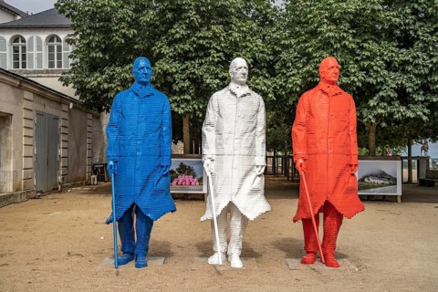 Three statues of Charles de Gaulle by the artist Michel Audiard in the colours of the Tricolore Blue