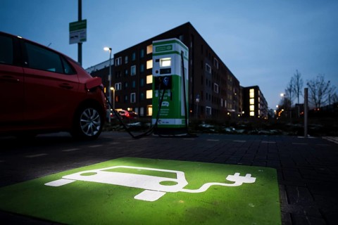 An e-car charges at a public charging station in Duesseldorf