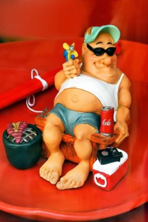 Shop window with funny ceramic figure