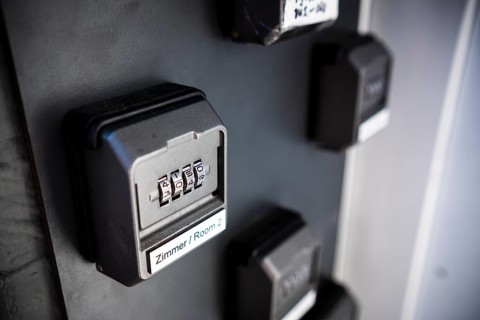 Combination locks for deposited keys for access to rooms in a hotel hostel in Duesseldorf