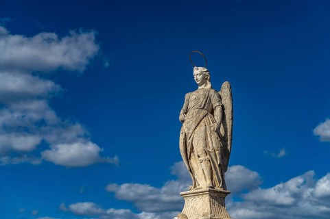 Statue of the Archangel Raphael on the Roman Bridge in Cordoba