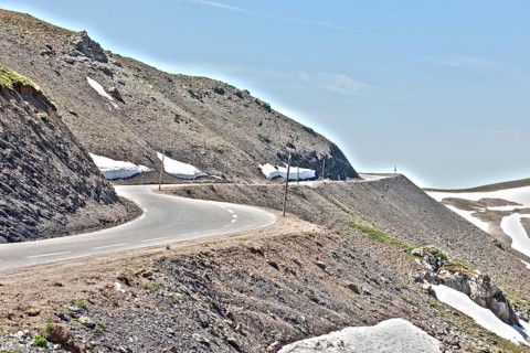 Photo with reduced dynamic saturation HDR of mountain pass alpine mountain road alpine road pass road pass view of highest asphalted alpine road ring road around Cime de la Bonette next to Col de la B...