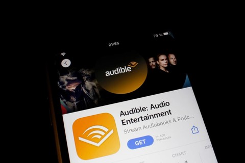 Detailed view of a smartphone with Audible app in the iPhone App Store