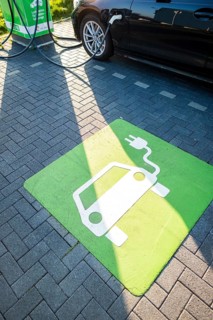 An e-car charges at a public charging station in Duesseldorf