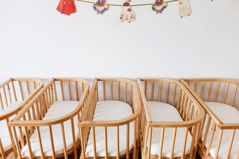 Empty cots in a maternity ward in a hospital