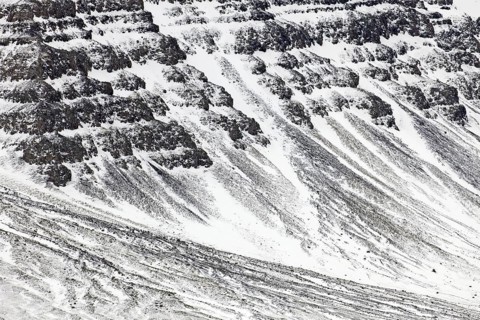 Snow covered talus cones and scree