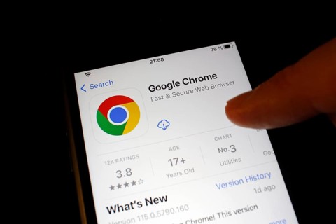 Detailed view of a smartphone with Google Chrome App in the iPhone App Store