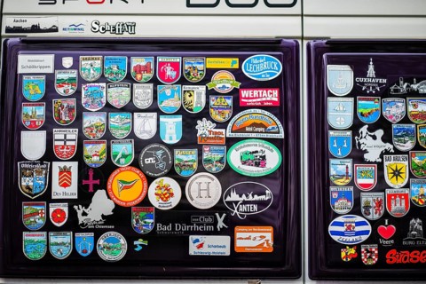 Sticker of travelled cities and federal states on a camper in Monheim am Rhein