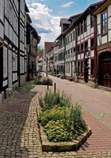 Narrow alley with historic half-timbered houses in the old town