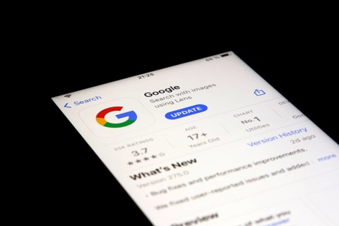 Detailed view of a smartphone with Google App in the iPhone App Store