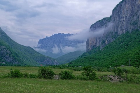 Komarnica Valley in the Dragisnica and Komarnica nature park Park with the mountains of the Durmitor massif and the Dinarides mountain range. Komarnica