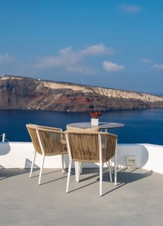 Sea view from terrace with chairs and table
