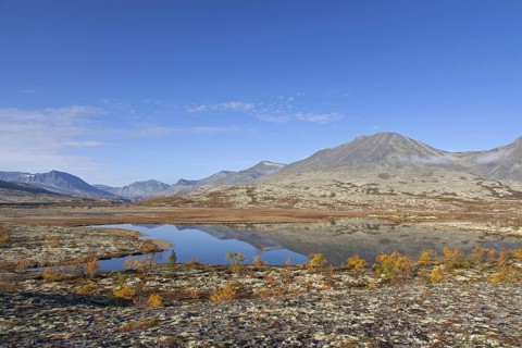 Lake in front of the mountain Stygghoin in autumn
