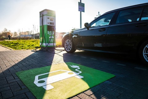 An e-car charges at a public charging station in Duesseldorf