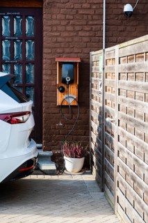 A car being charged at a public charging station