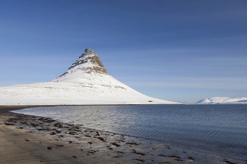Kirkjufell mountain on the Snaefellsnes peninsula in the snow in winter