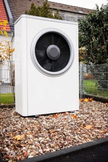 Air source heat pump in front of an apartment building in Hilden