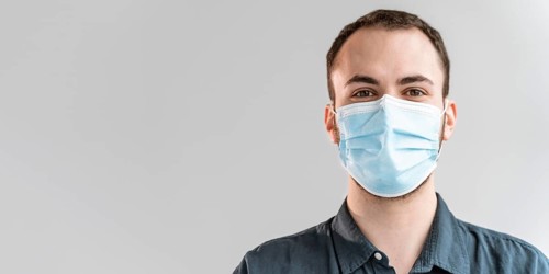 Portrait businessman with mask