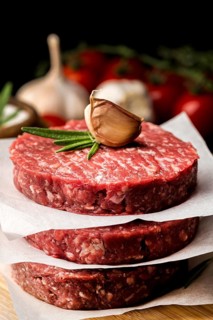 High angle meat with garlic herbs