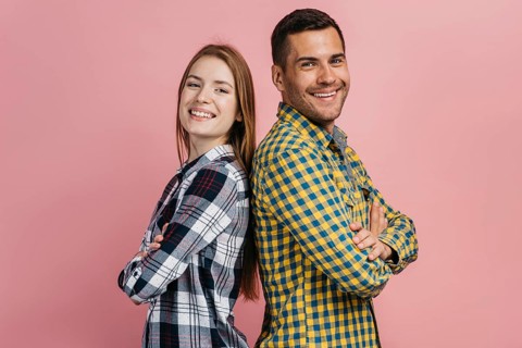 Man woman posing looking camera