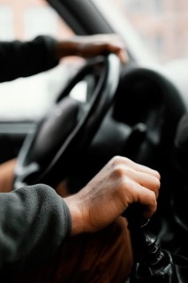 Close up man car driving