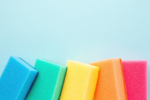 Colorful sponges with copy space