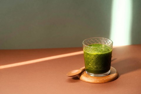 High angle green smoothie glass