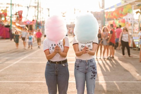 Happy friends having fun amusement park
