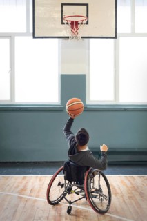 Full shot man playing basketball
