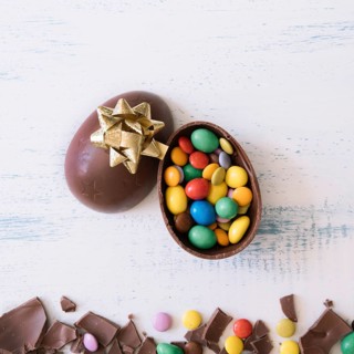 Close up egg with candies bow