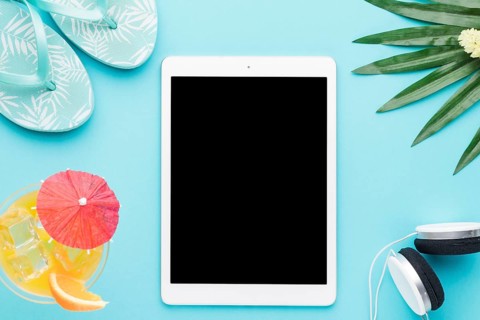 Tablet summer things colored background
