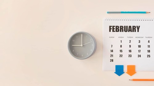 Top view desk february calendar clock