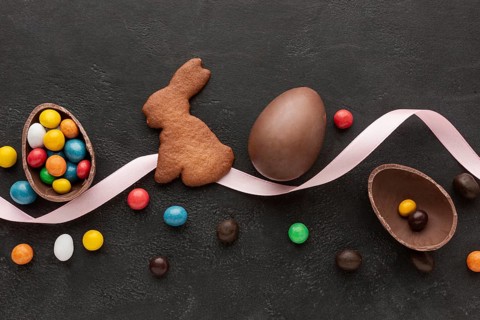 Chocolate egg easter bunny shaped cookie with candy