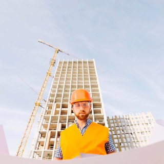 Bearded man studying draft